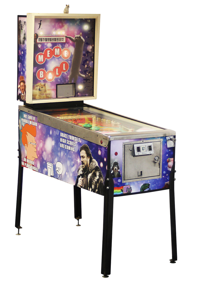 Illustration for article titled The present bounces against the past in this meme-themed pinball table